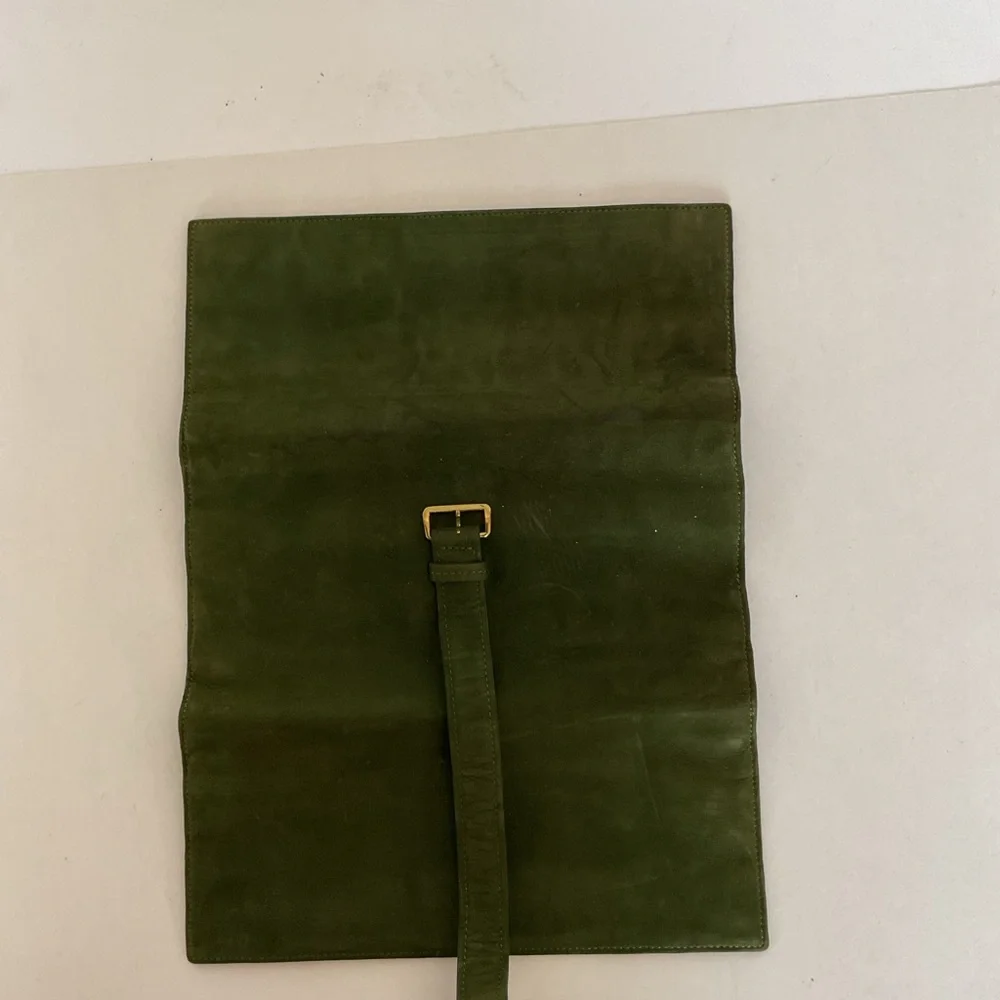 Saks Fifth Avenue vintage green suede leather jewelry roll.